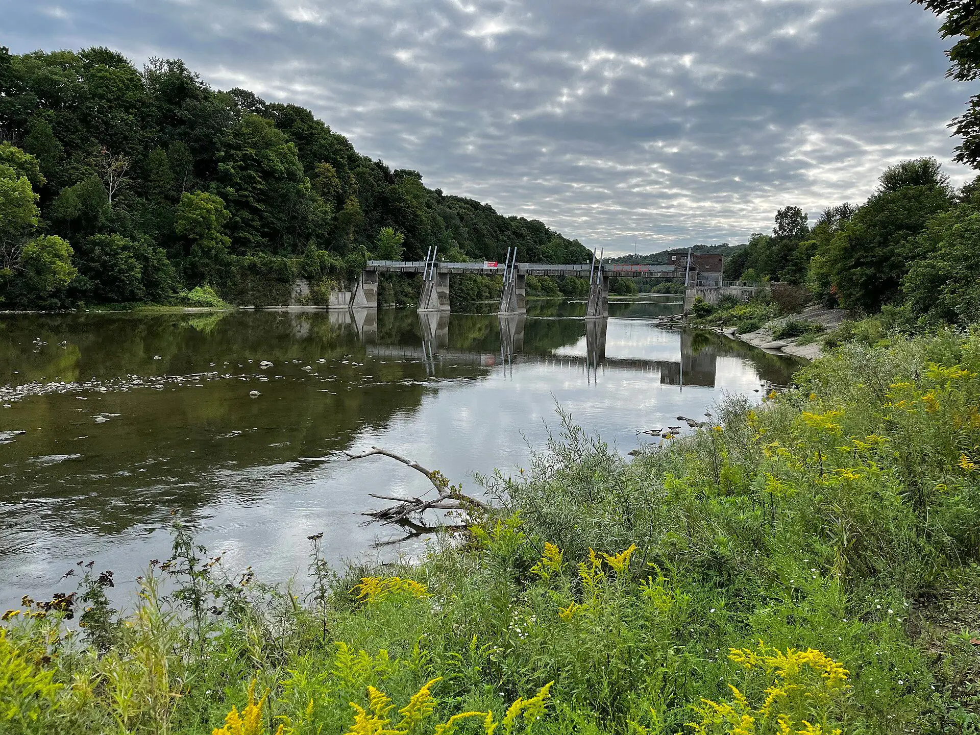 The Thames River curving past wooded banks at Springbank Park in Byron