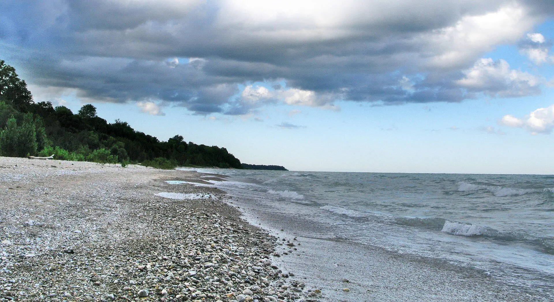 A pebble beach on Lake Huron at Bayfield under a wide sky