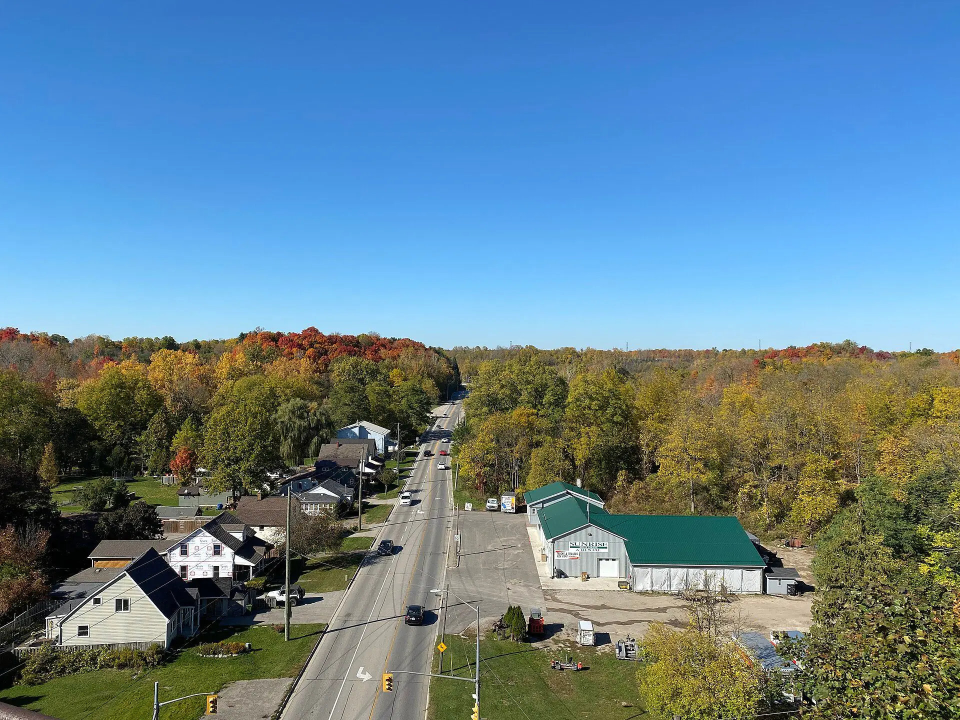 Storey-and-a-half homes and bungalows along Sunset Drive, seen in autumn from the Elevated Park in St. Thomas