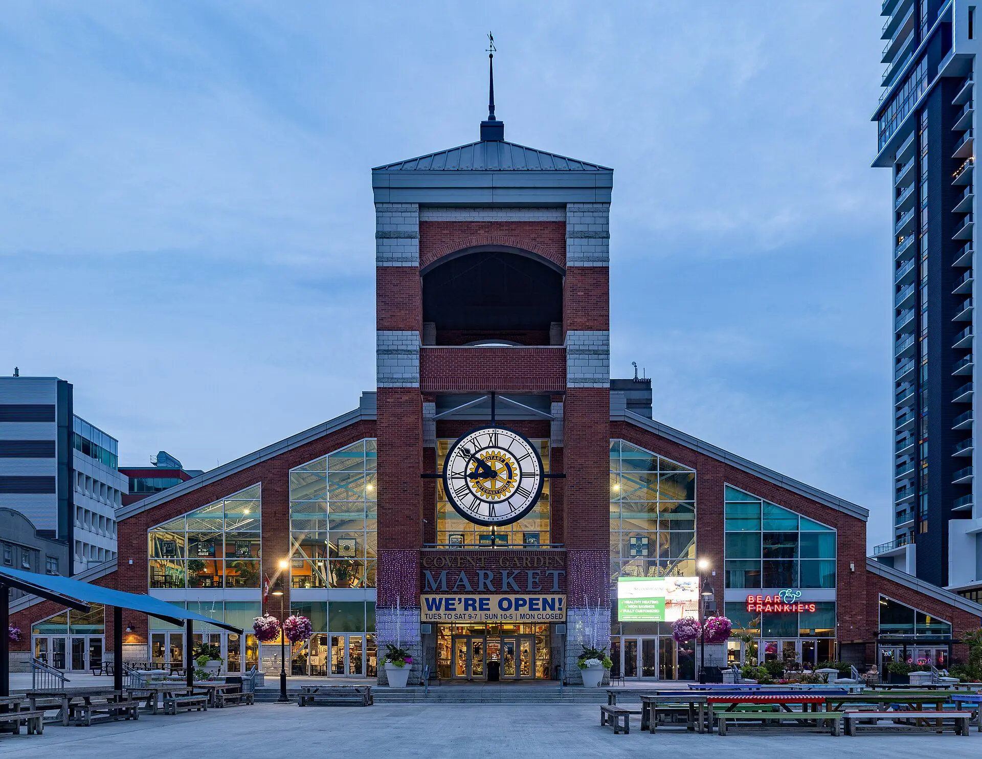 The clock tower of Covent Garden Market at dusk in downtown London